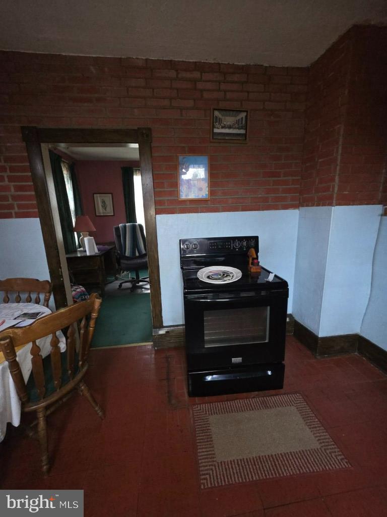 132 Mayfair Road Paxinos, PA 17860 - Photo 17 of 17 a living room with furniture and a wooden floor