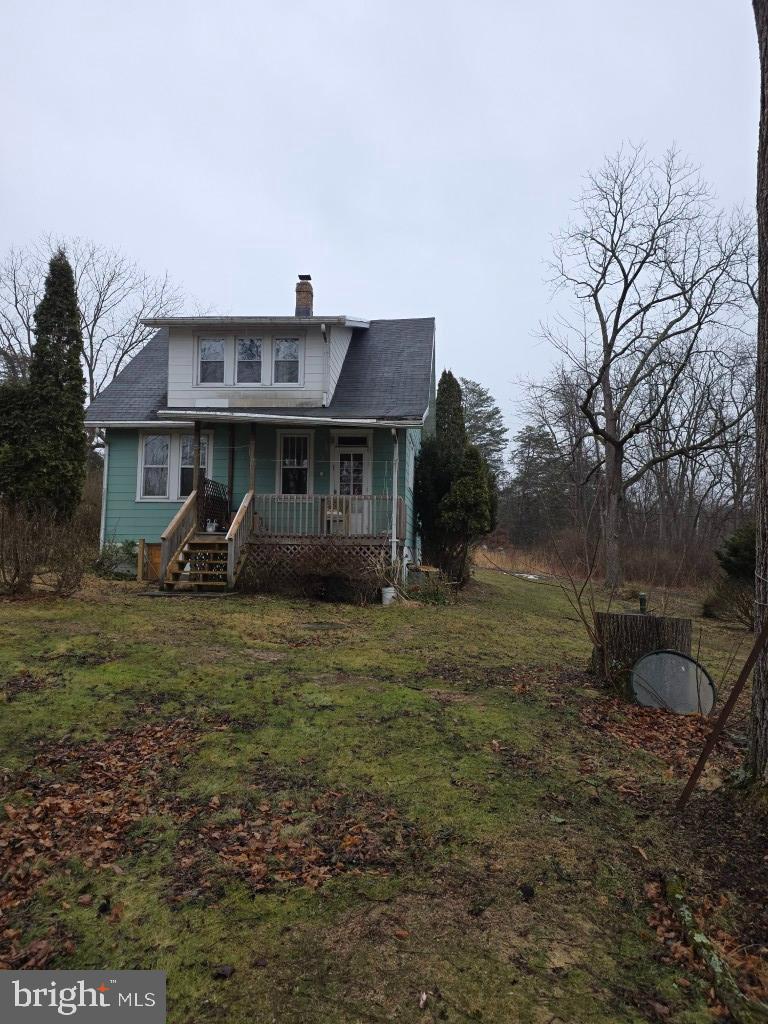 132 Mayfair Road Paxinos, PA 17860 - Photo 2 of 17 a front view of a house with a garden