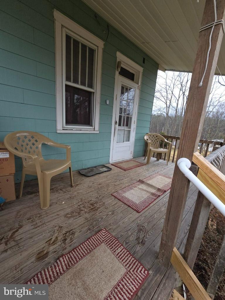 132 Mayfair Road Paxinos, PA 17860 - Photo 3 of 17 a living room with furniture and a fireplace