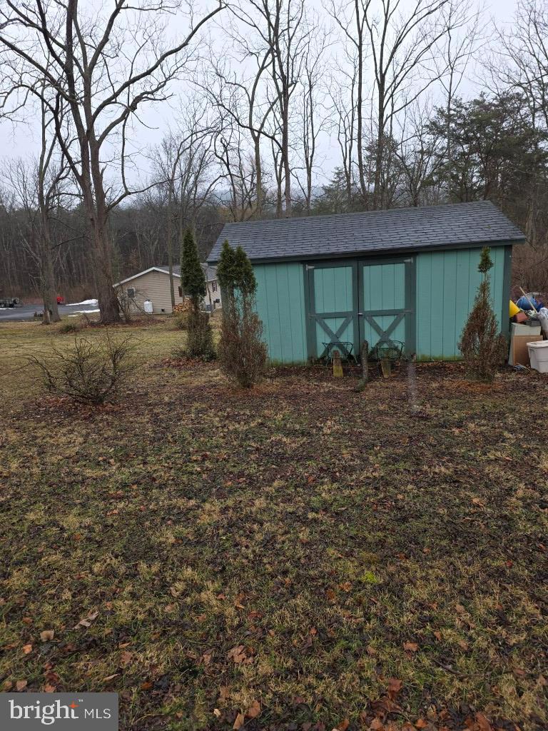 132 Mayfair Road Paxinos, PA 17860 - Photo 4 of 17 a backyard of a house with lots of green space