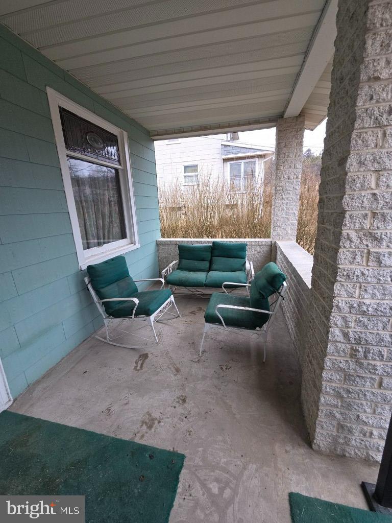 132 Mayfair Road Paxinos, PA 17860 - Photo 5 of 17 a view of a couches in patio