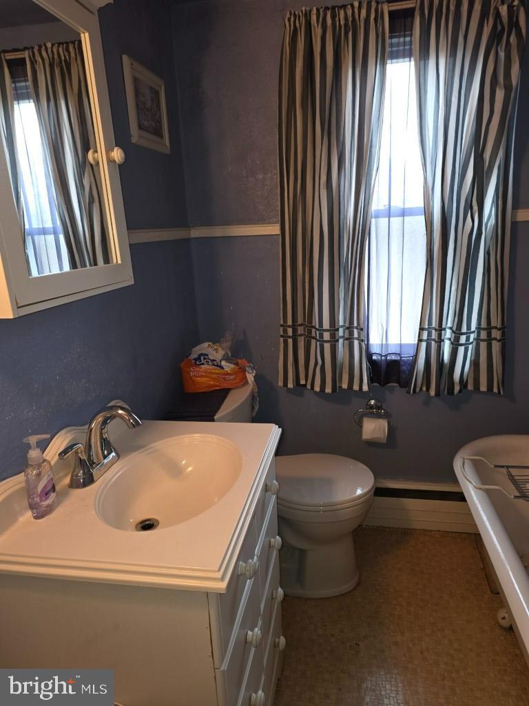 132 Mayfair Road Paxinos, PA 17860 - Photo 7 of 17 a bathroom with a sink toilet and mirror