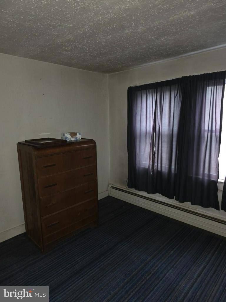 132 Mayfair Road Paxinos, PA 17860 - Photo 8 of 17 a view of room with window and hardwood floor