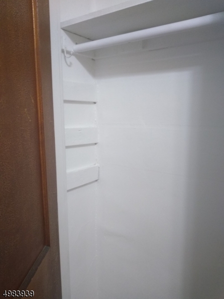 931 Madison Avenue Elizabeth, NJ 07201 - Photo 14 of 23 a view of an empty walk in closet