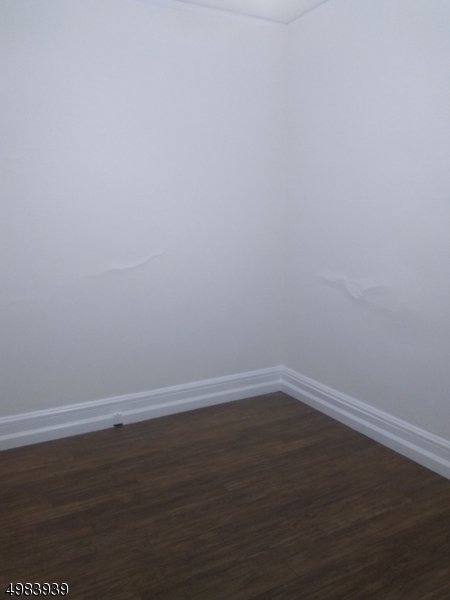 931 Madison Avenue Elizabeth, NJ 07201 - Photo 15 of 23 a view of a room with wooden floor