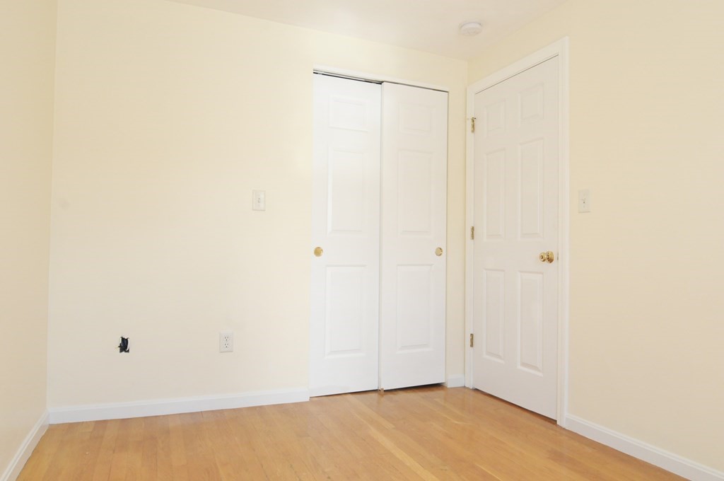174 Maverick Street, Unit 3 Boston, MA 02128 - Photo 4 of 10 a view of an empty room