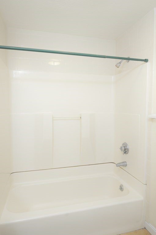 174 Maverick Street, Unit 3 Boston, MA 02128 - Photo 9 of 10 a bathroom with a shower