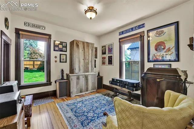 a living room with furniture and a window