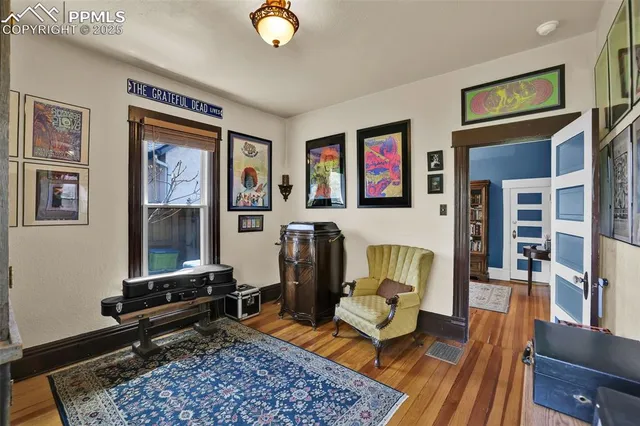 a living room with furniture and a rug