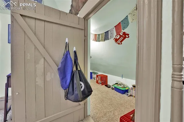 a kids room with toys and toys