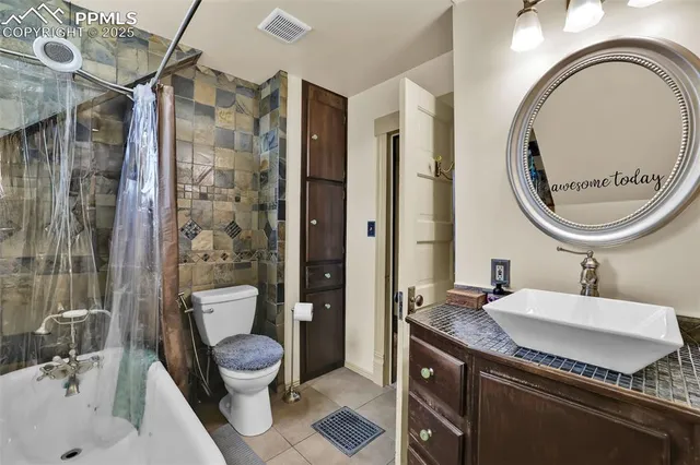 a view of a backyard with sitting area