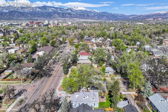 a view of a city with mountain