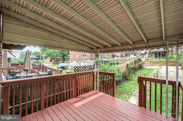a balcony with wooden floor in outdoor space