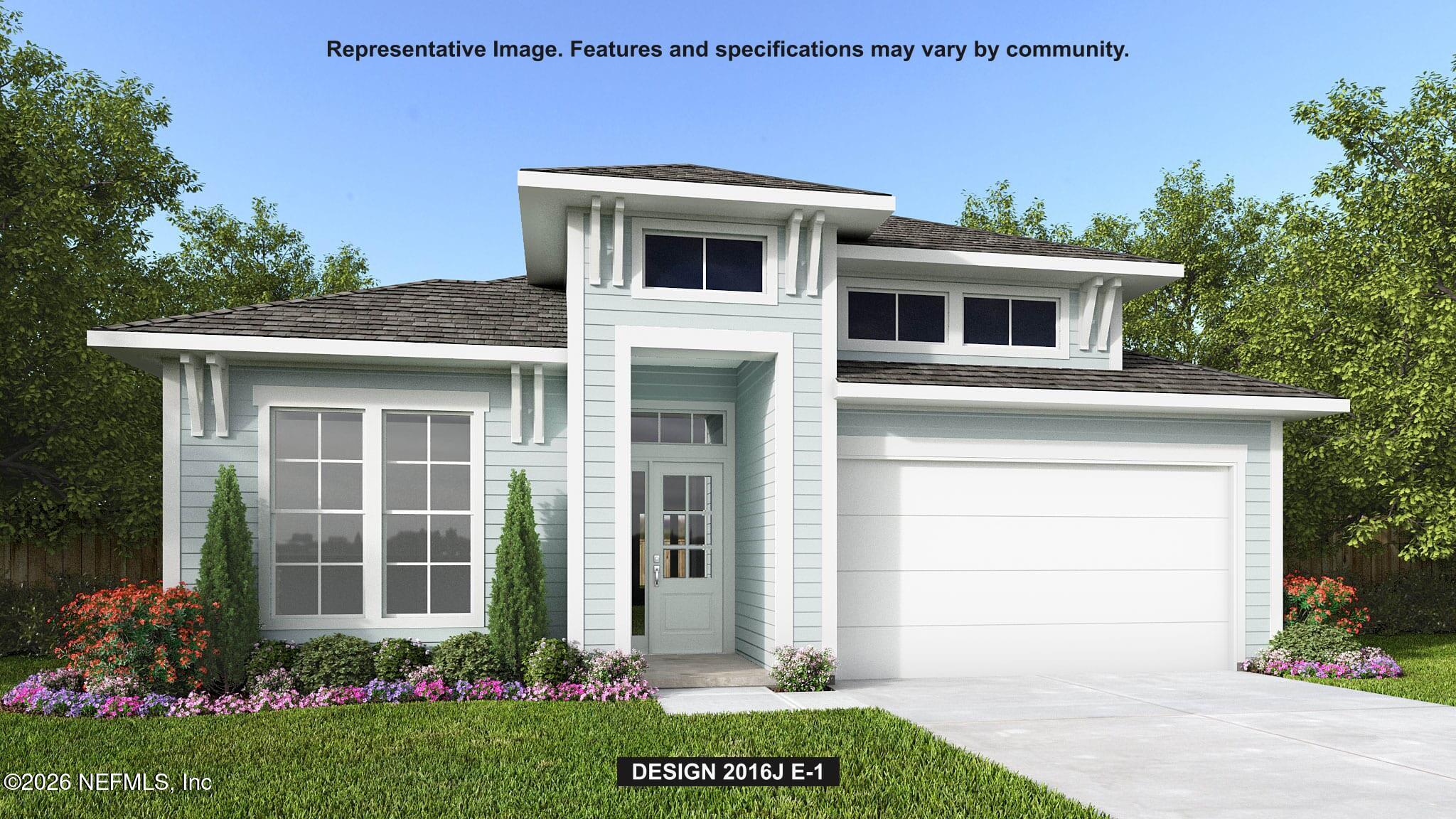 2907 Berryhill Road Green Cove Springs, FL 32043 - Photo 1 of 3 a front view of a house with a garden