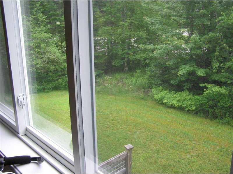 210 Great Harbor Condominium Road, Unit 210 Southwest Harbor, ME 04679 - Photo 7 of 12 View. View south from living room.
