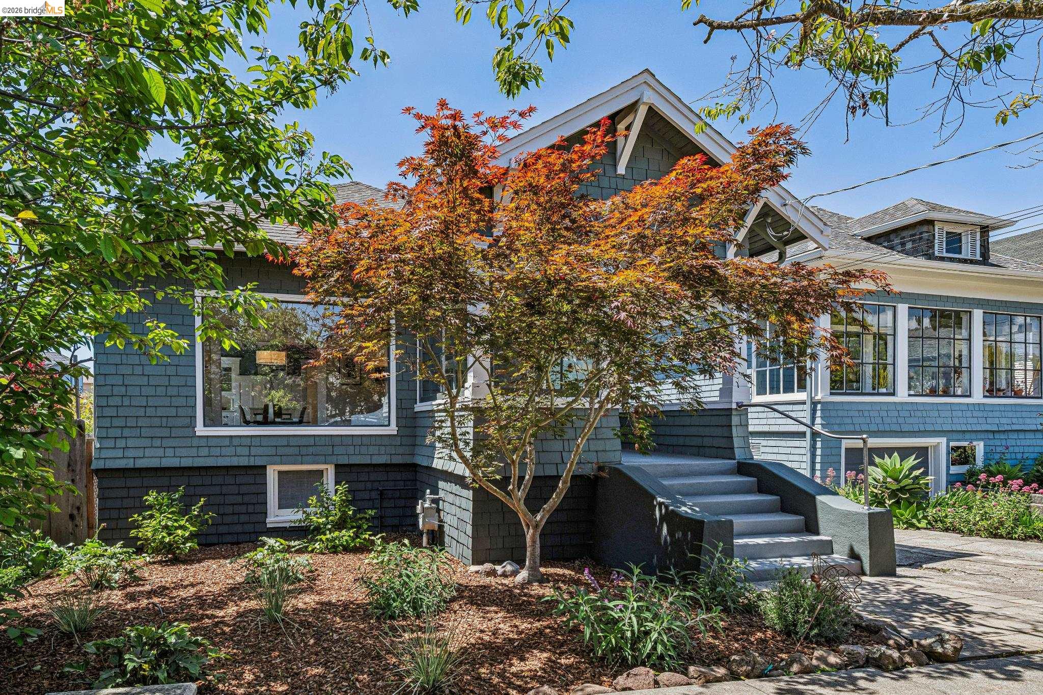 6521 Dover Street Berkeley, CA 94703 - Photo 3 of 80 Craftsman-style exterior with shingle siding and a prominent dormer