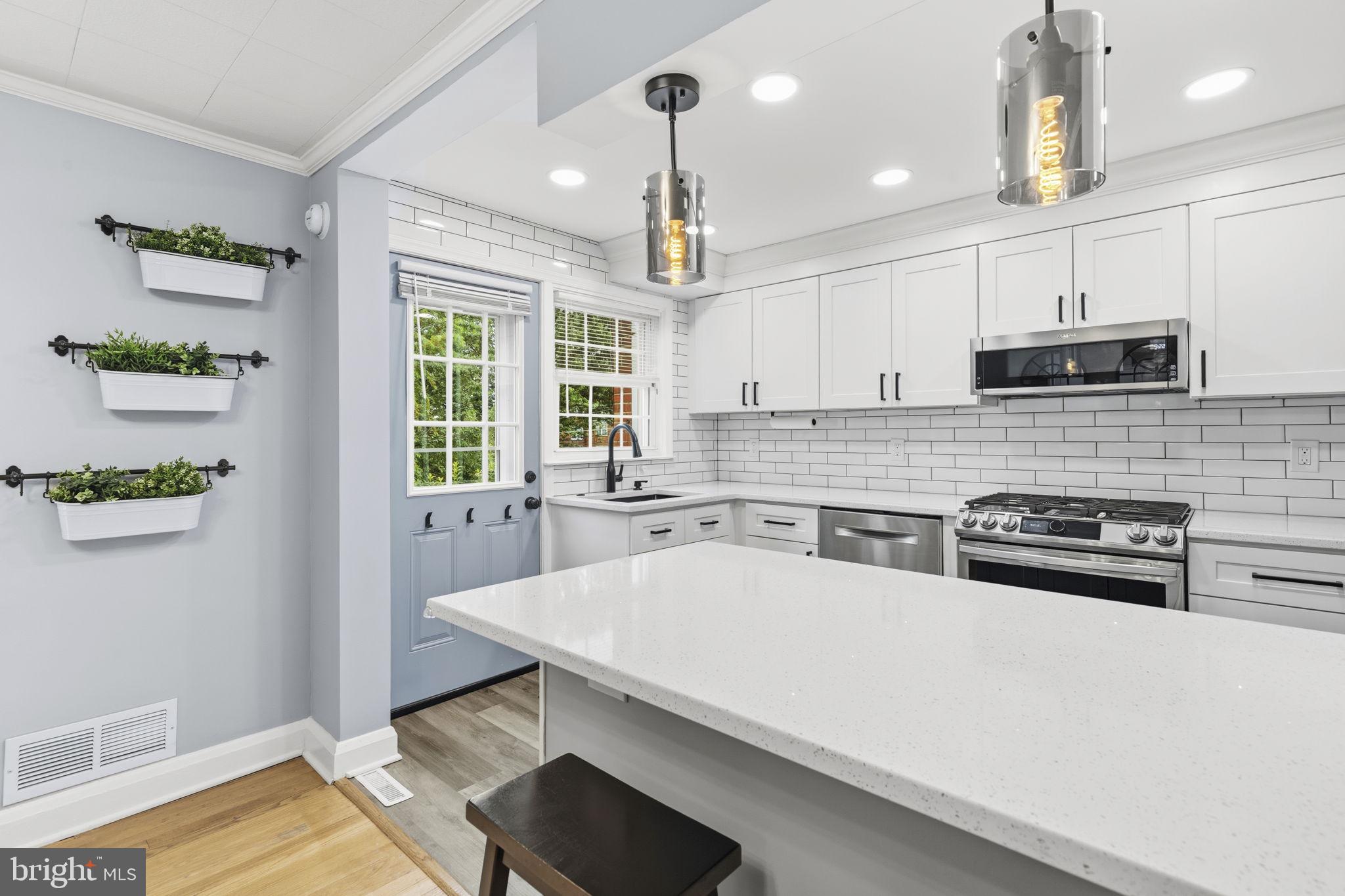1587 Doxbury Road Towson, MD 21286 - Photo 8 of 31 Modern kitchen with stylish accents.