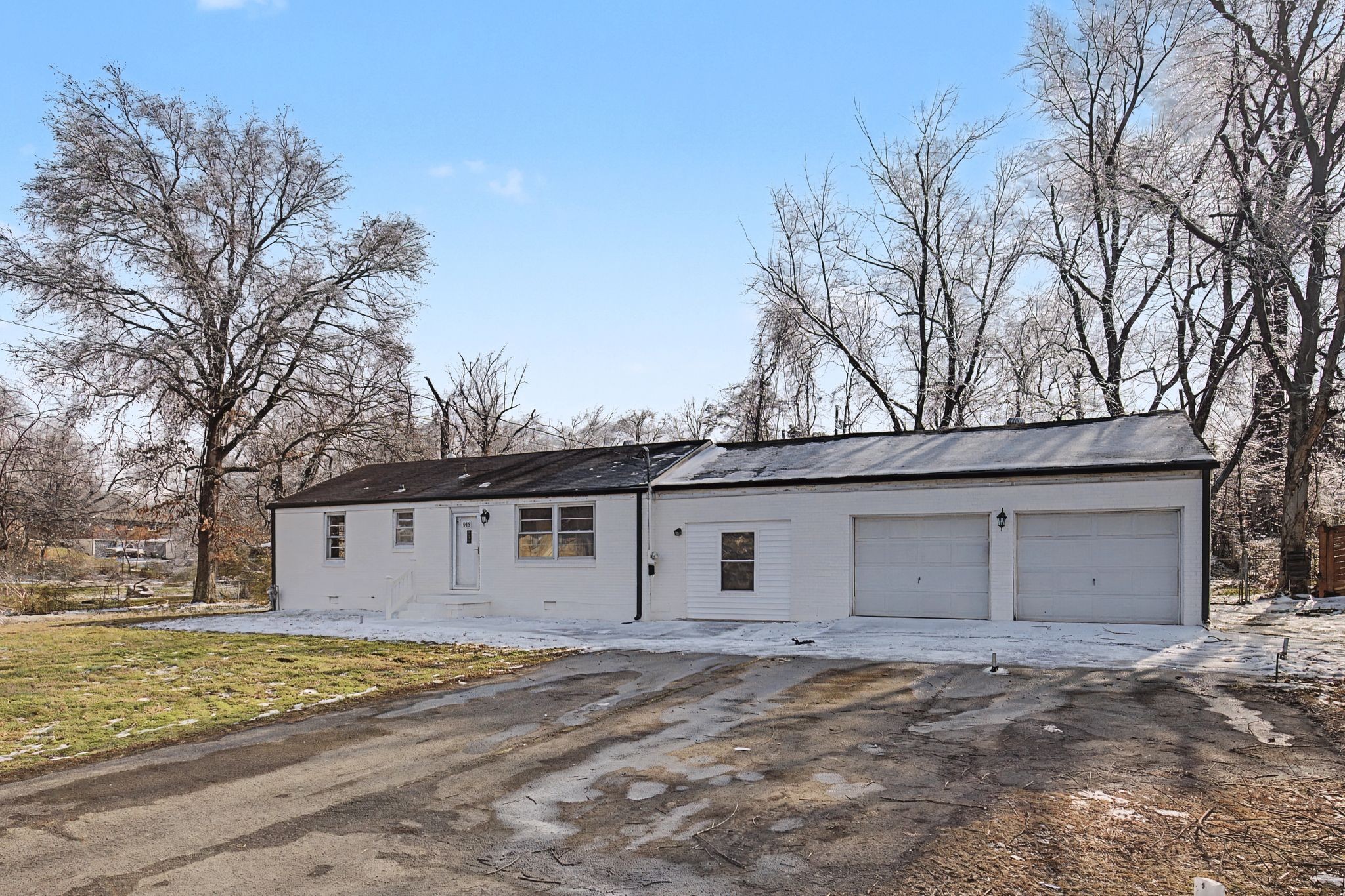 845 Richards Road Antioch, TN 37013 - Photo 1 of 24 a front view of a house with a yard and garage