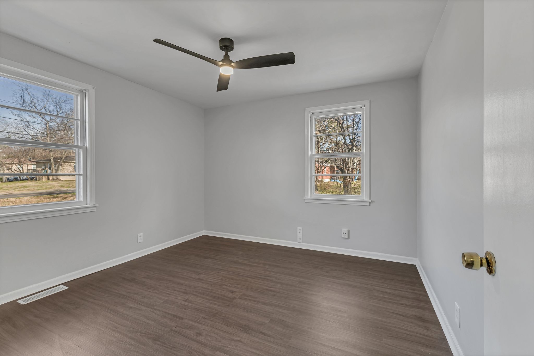 845 Richards Road Antioch, TN 37013 - Photo 17 of 24 a view of empty room with wooden floor and fan