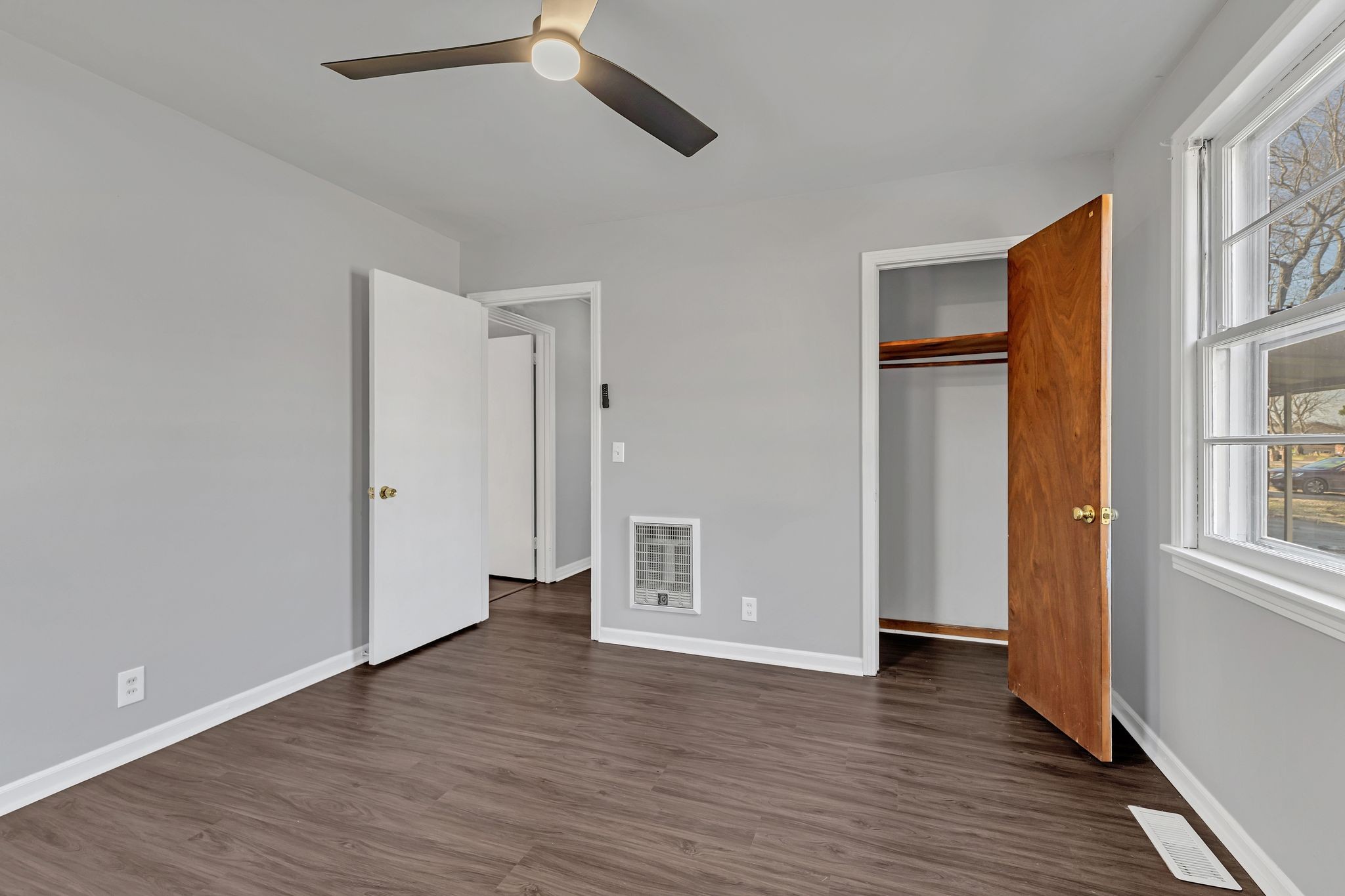 845 Richards Road Antioch, TN 37013 - Photo 18 of 24 a view of an empty room with wooden floor and a window
