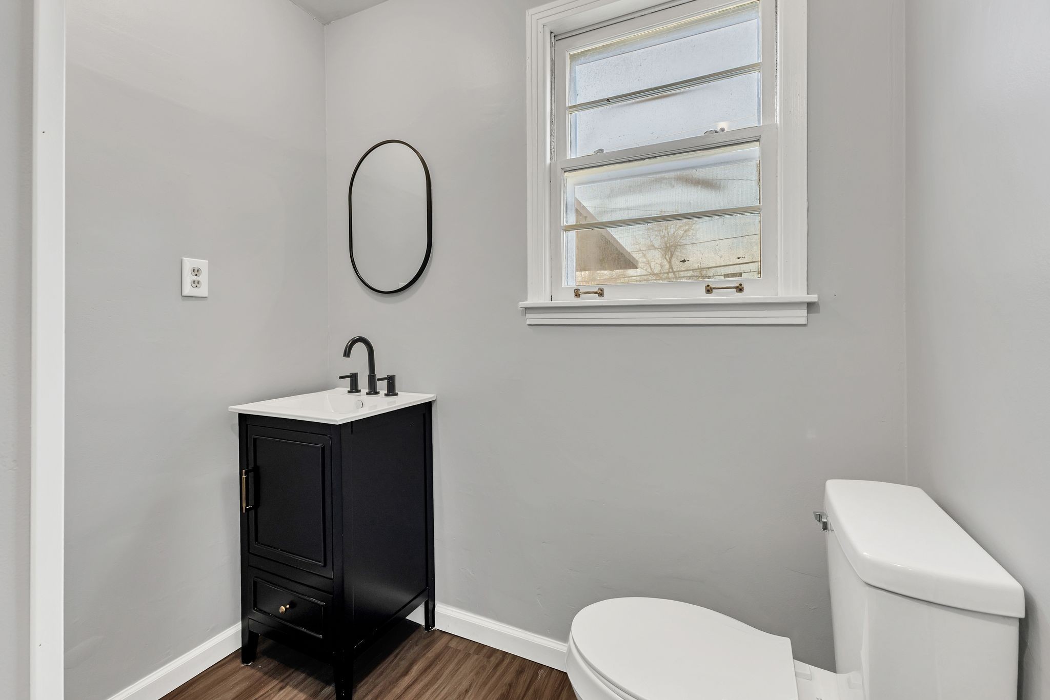 845 Richards Road Antioch, TN 37013 - Photo 19 of 24 a bathroom with a toilet a sink and mirror