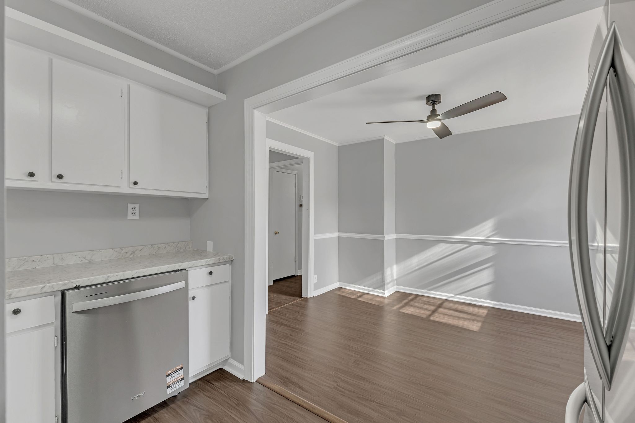 845 Richards Road Antioch, TN 37013 - Photo 9 of 24 a view of empty room with wooden floor and white cabinet