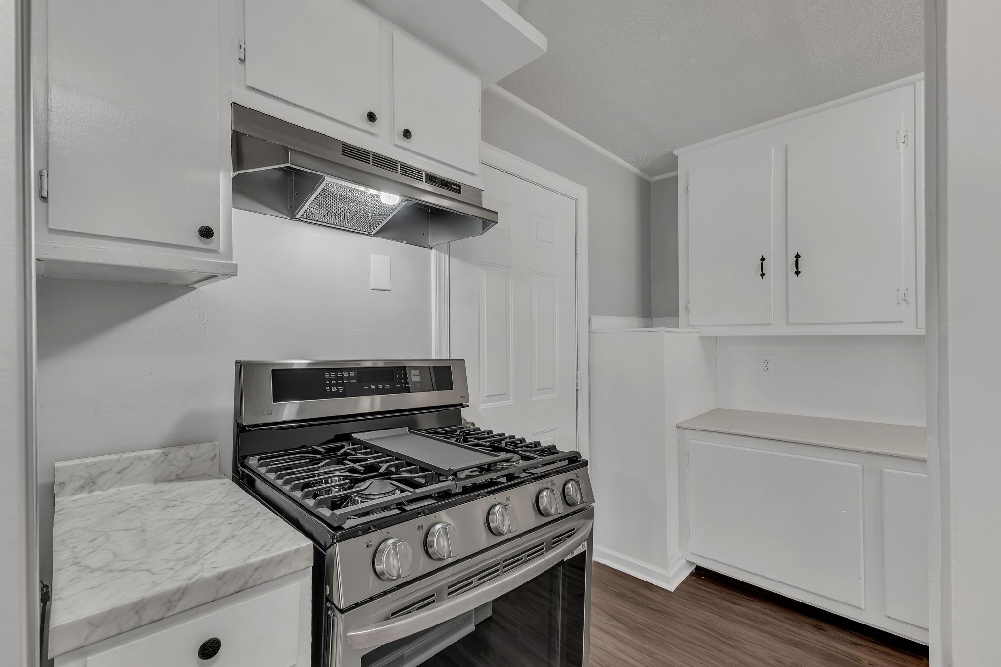 845 Richards Road Antioch, TN 37013 - Photo 10 of 24 a stove top oven sitting inside of a kitchen
