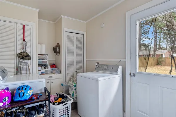 a storage room with washer and dryer