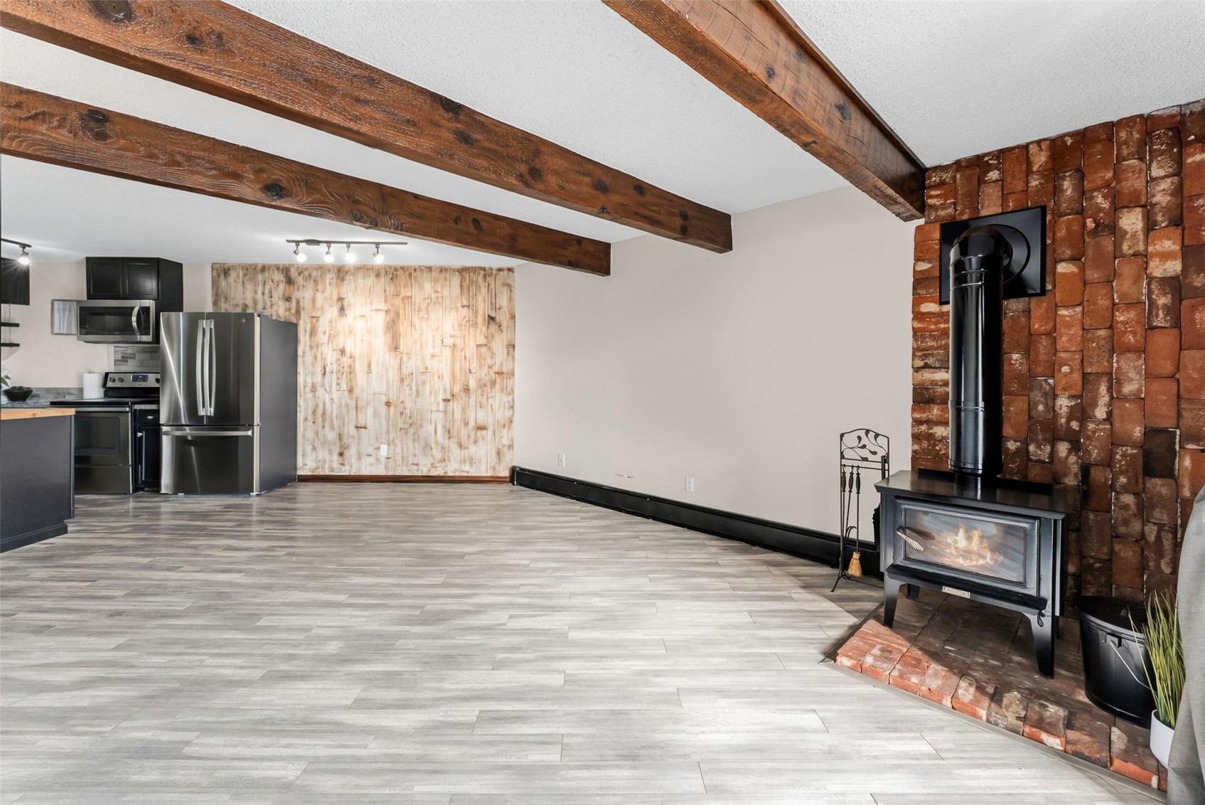 7124 Ryan Gulch Road, Unit 204 Wildernest, CO 80498 - Photo 16 of 36 a view of an entryway with wooden floor and door