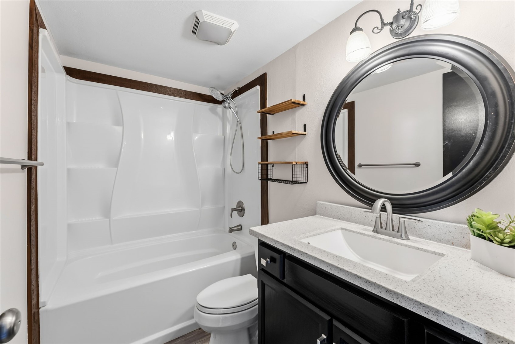 7124 Ryan Gulch Road, Unit 204 Wildernest, CO 80498 - Photo 28 of 36 a bathroom with a sink a toilet and a mirror