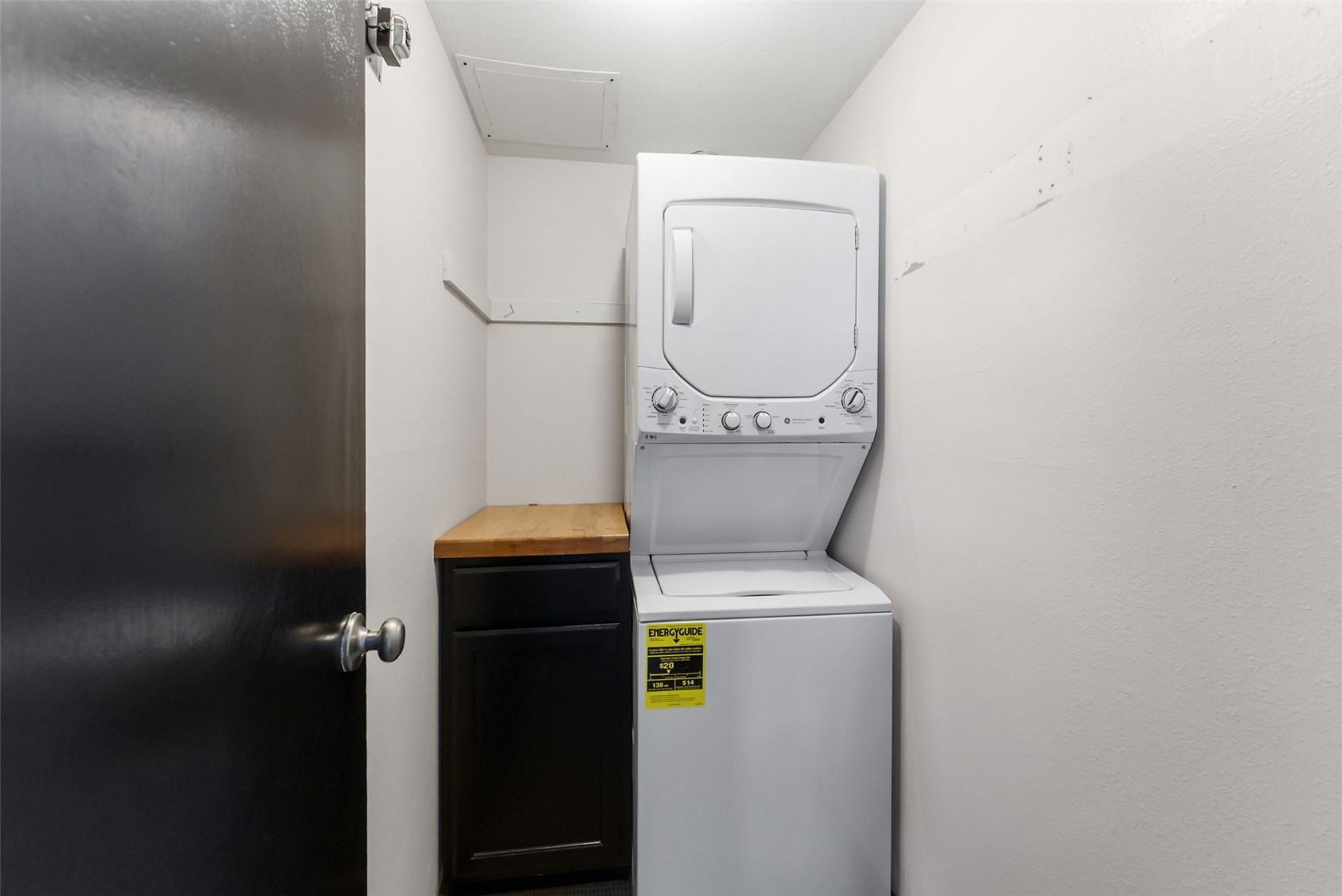 7124 Ryan Gulch Road, Unit 204 Wildernest, CO 80498 - Photo 29 of 36 Laundry room with stacked washing machine and dryer