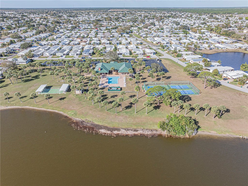 7648 Kyak Court, Unit Q16 Sebastian, FL 32976 - Photo 33 of 34 an aerial view of residential houses with outdoor space