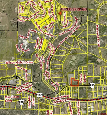 a view of a lake with a city