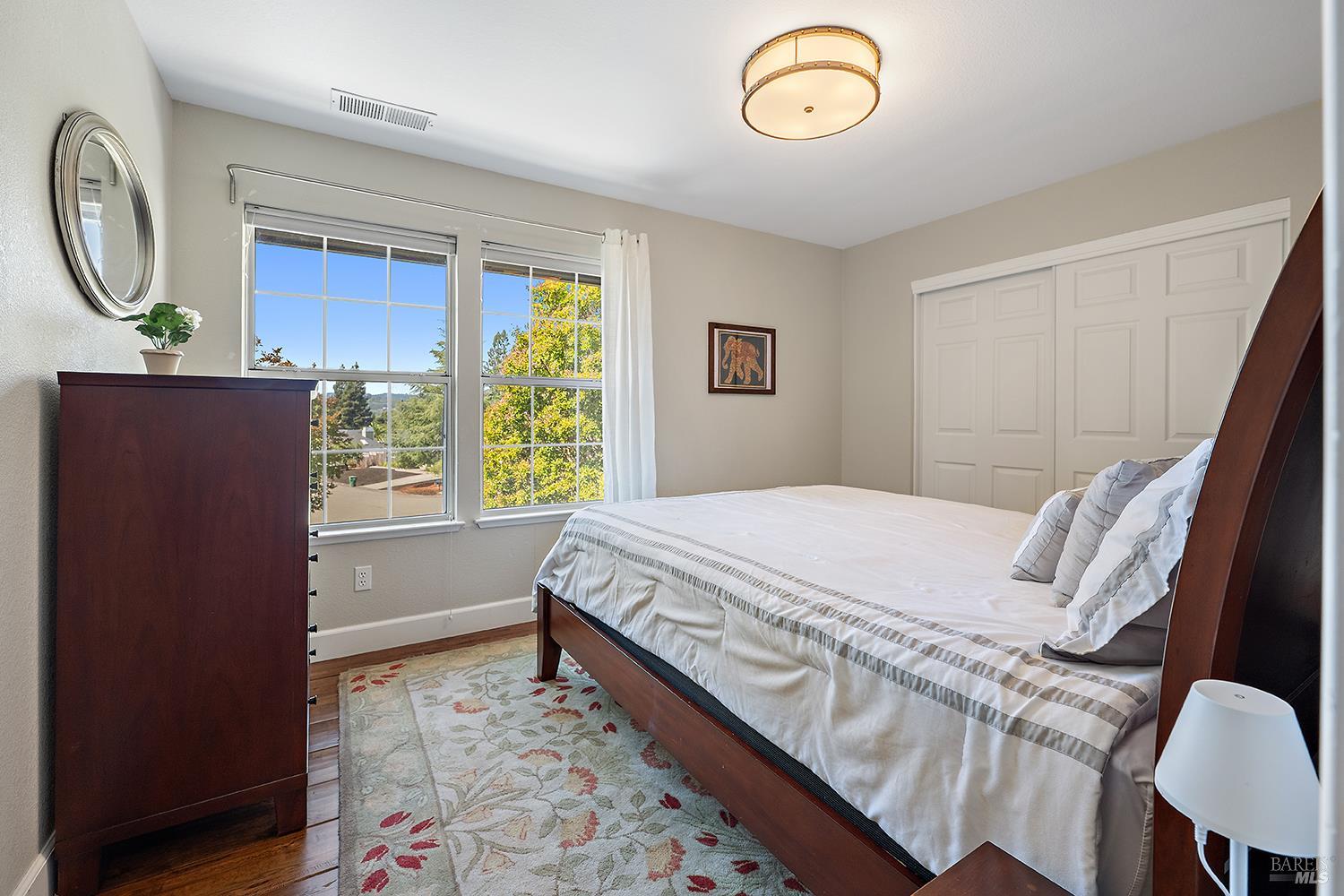 3991 Haven Court Sebastopol, CA 95472 - Photo 26 of 60 a bed sitting in a bedroom next to a window