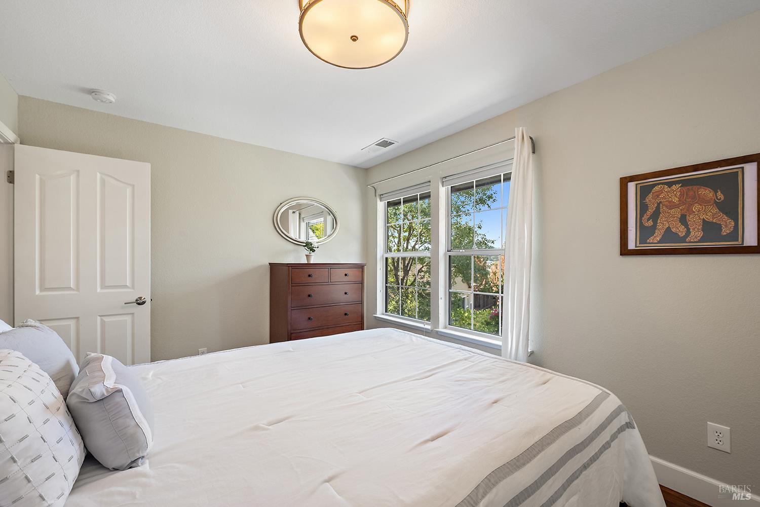 3991 Haven Court Sebastopol, CA 95472 - Photo 27 of 60 a bedroom with a bed and a window