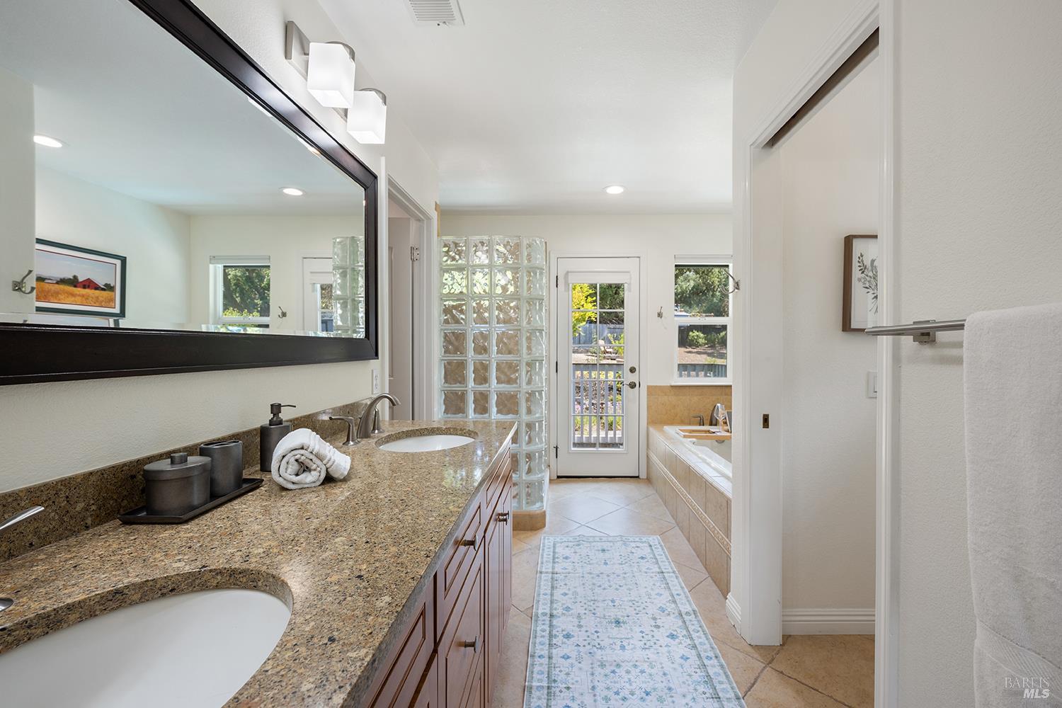 3991 Haven Court Sebastopol, CA 95472 - Photo 30 of 60 a room with granite countertop furniture and a flat screen tv