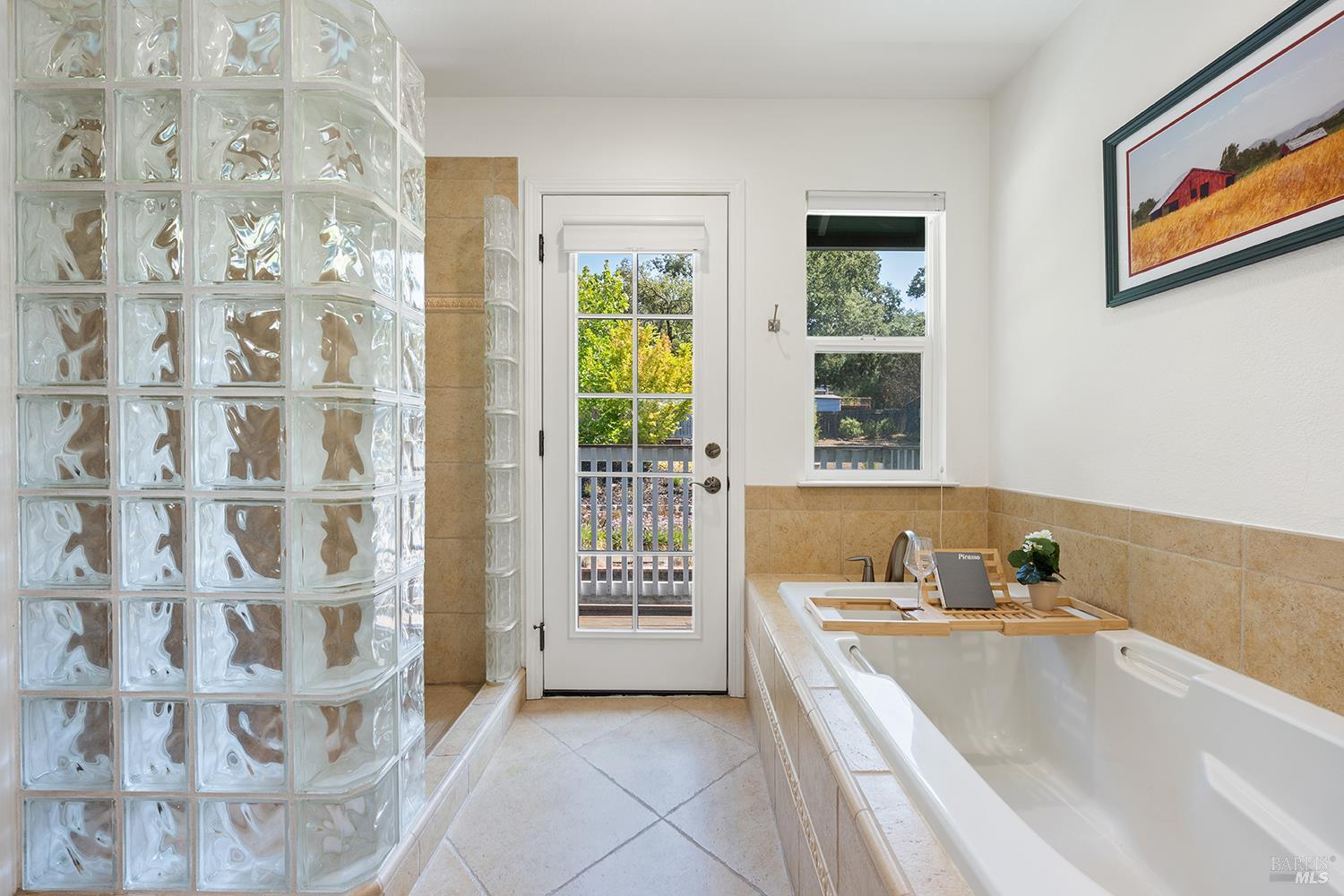 3991 Haven Court Sebastopol, CA 95472 - Photo 31 of 60 a spacious bathroom with a bathtub and next to a window