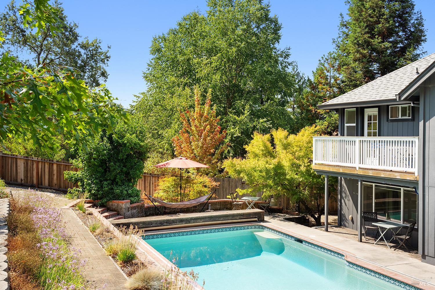 3991 Haven Court Sebastopol, CA 95472 - Photo 45 of 60 a view of house with yard outdoor seating and covered with trees