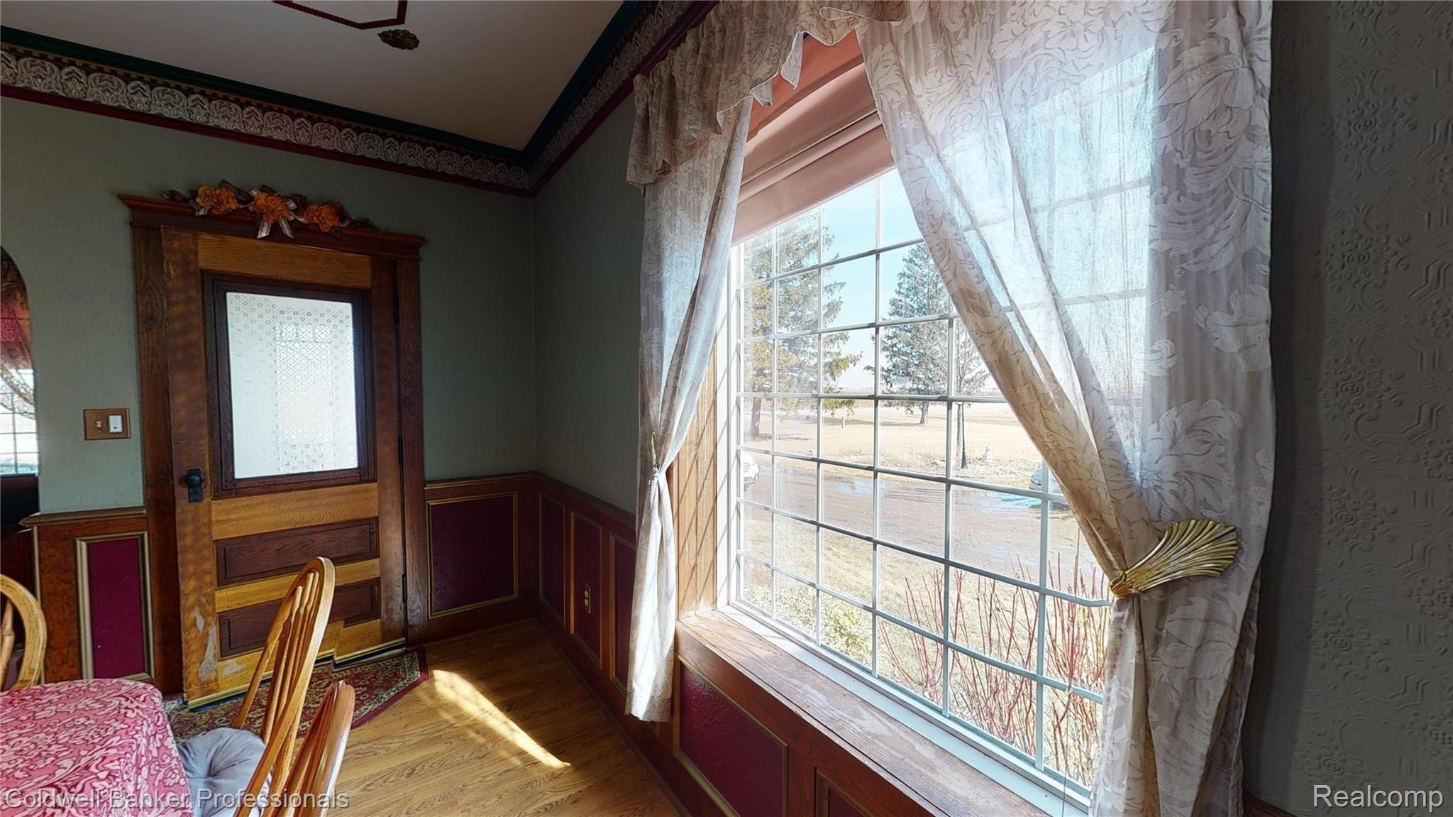6323 Berne Road Pigeon, MI 48755 - Photo 16 of 62 Dining window and door out front porch.jpg