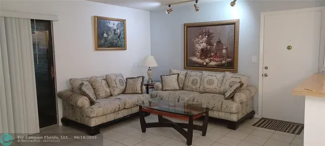 a living room with furniture and a couch