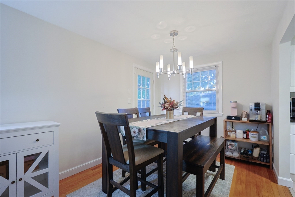 182 Summer Street Framingham, MA 01701 - Photo 14 of 30 a view of a dining room with furniture and wooden floor
