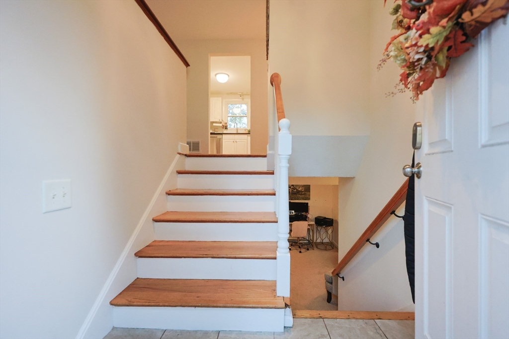 182 Summer Street Framingham, MA 01701 - Photo 5 of 30 a view of entryway and hall with wooden floor