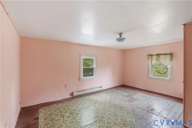 an empty room with windows