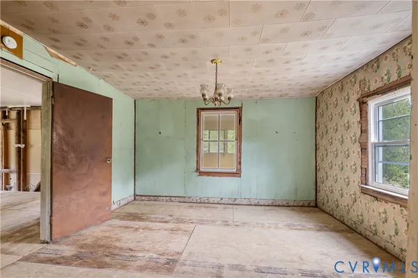 an empty room with windows