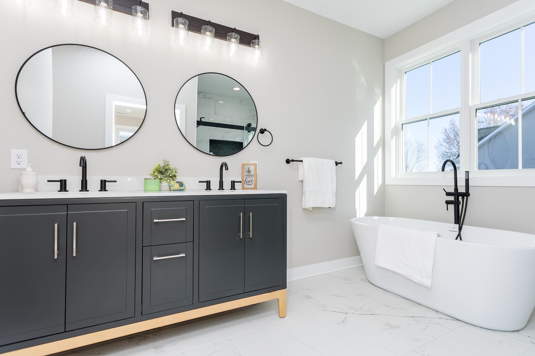 123 Willow Drive Dayton, VA 22821 - Photo 19 of 44 a bathroom with a double vanity sink and a mirror
