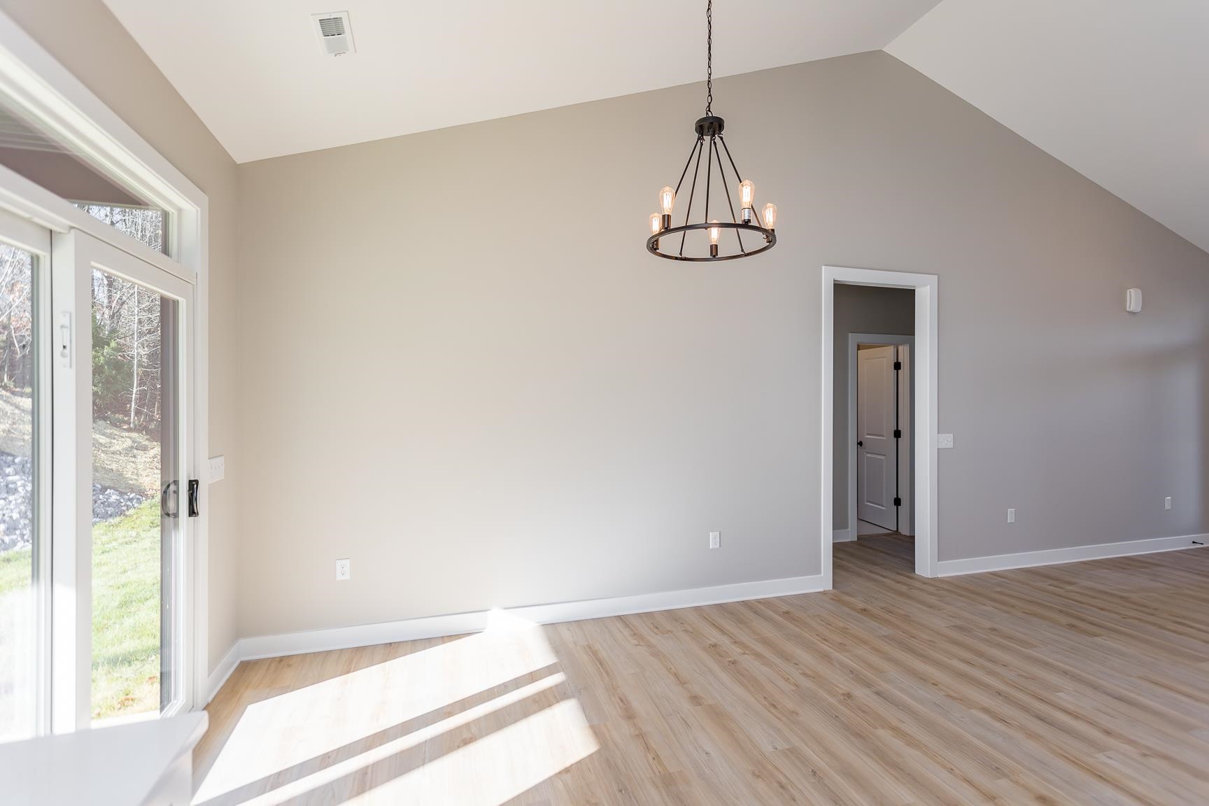 123 Willow Drive Dayton, VA 22821 - Photo 28 of 44 a view of empty room with wooden floor and window