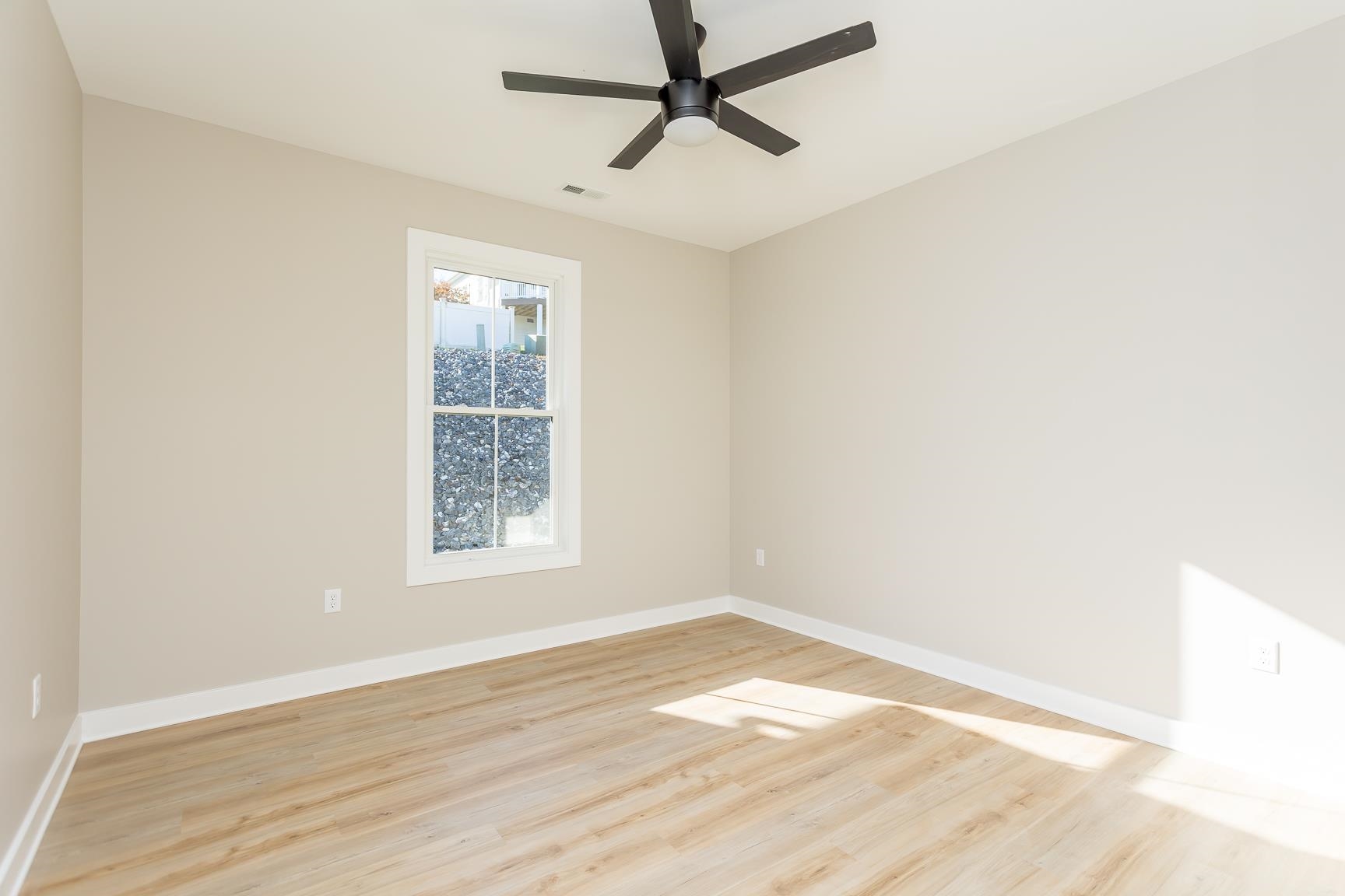 123 Willow Drive Dayton, VA 22821 - Photo 32 of 44 an empty room with wooden floor and windows