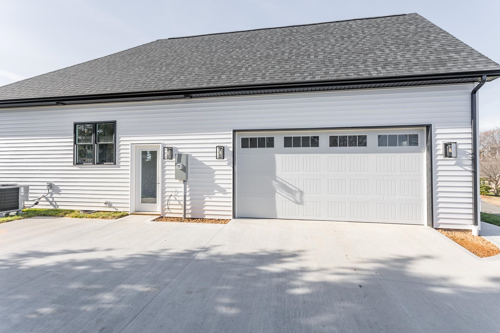 123 Willow Drive Dayton, VA 22821 - Photo 42 of 44 a front view of a house with a garage