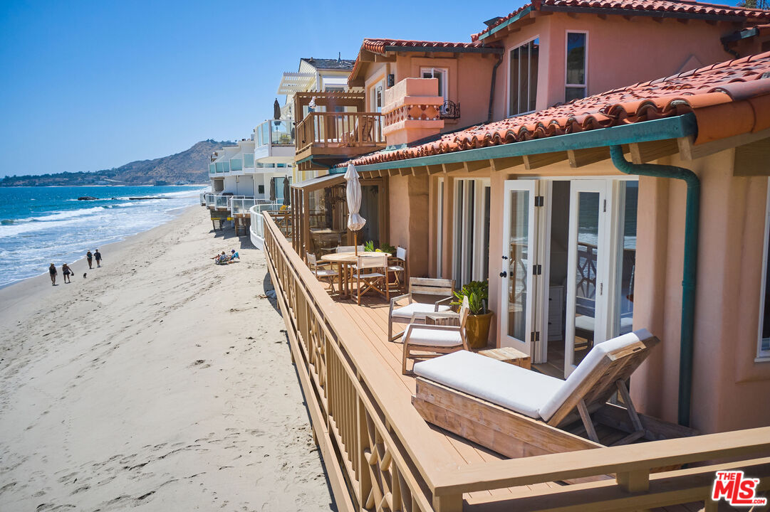 25110 Malibu Road Malibu, CA 90265 - Photo 5 of 28 a view of roof deck with two chairs and potted plants