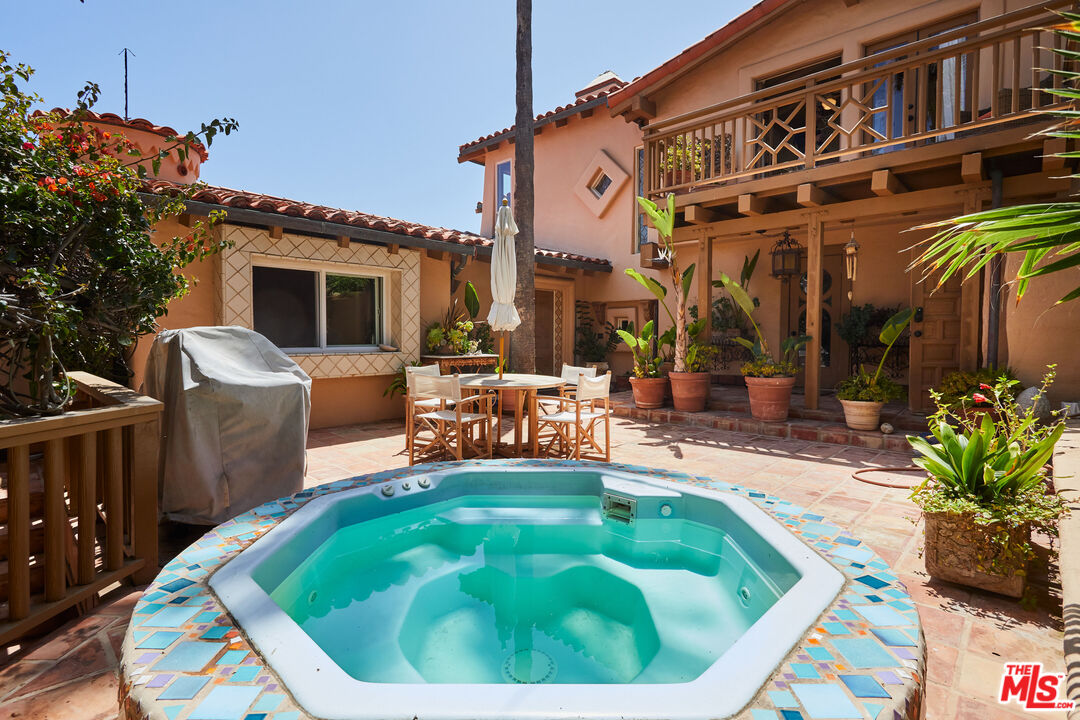 25110 Malibu Road Malibu, CA 90265 - Photo 7 of 28 a backyard of a house with yard and outdoor seating